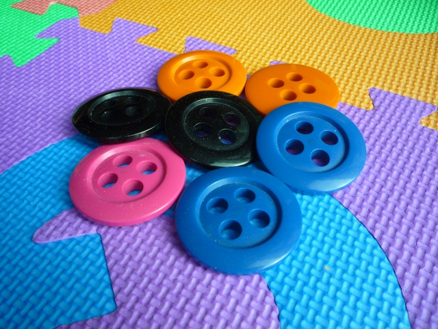 Big buttons as toys